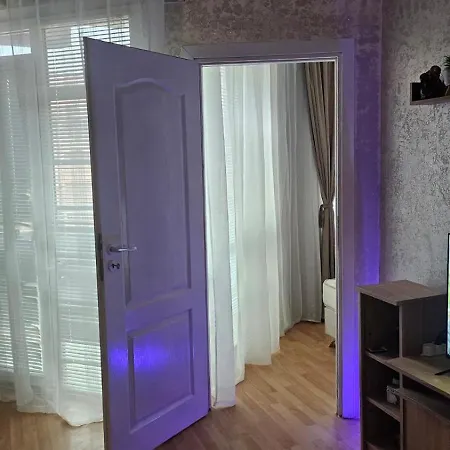 Family In Sunny Apartment